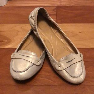 Penny loafer gold flats